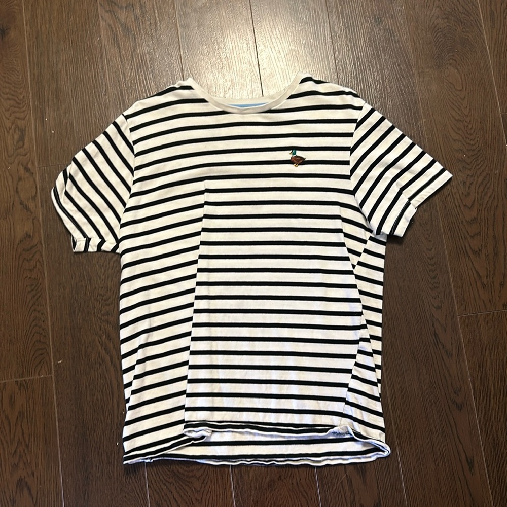 A white and black striped shirt with a duck on it!